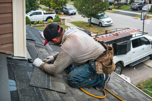 Professional Roofing technician working in Newfield, NY